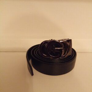 Black leather belt with buckle